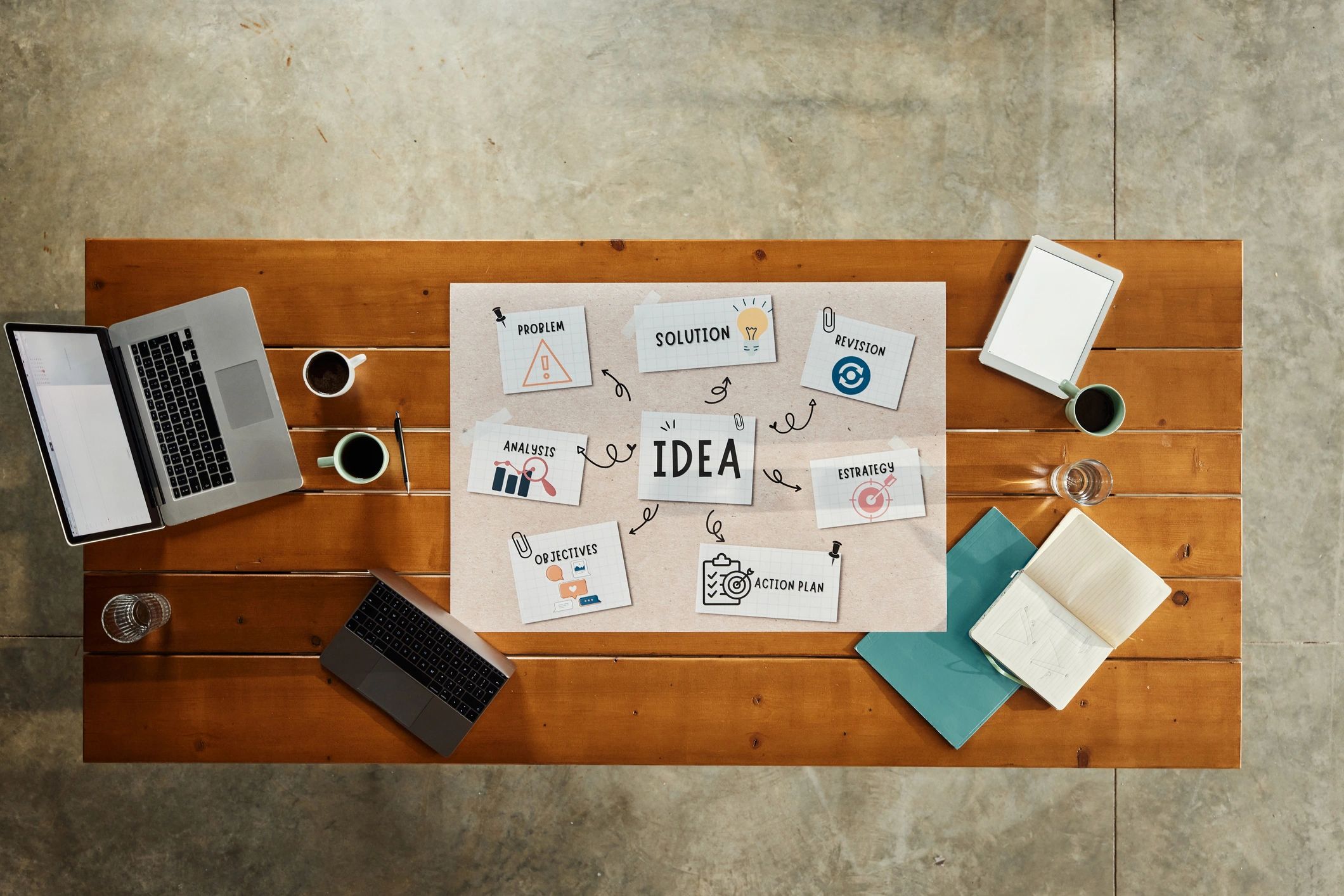Creative branding materials arranged on a workspace desk